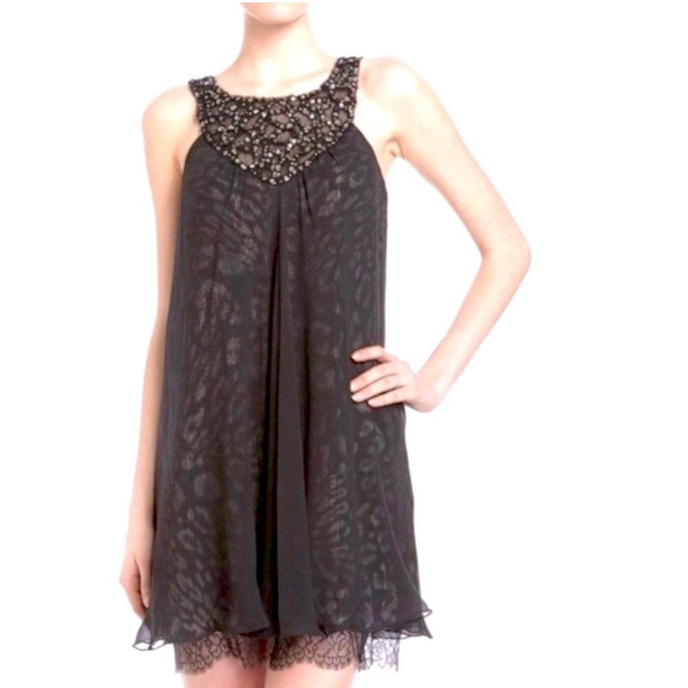 Women’s BCBG Max Azria crepe cheetah/blk cocktail dress.
